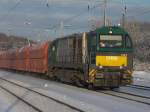 Dh 58 von der HGK mit einem Kohlezug in K�ln-West am 18.12.2010.
